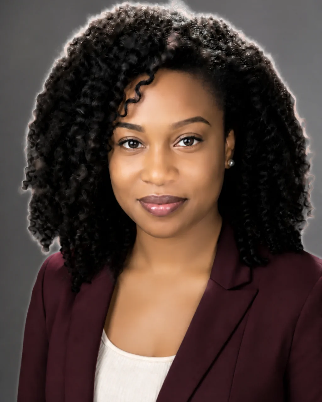 AI headshot with over-smoothed skin and a ragged, masked hair edge